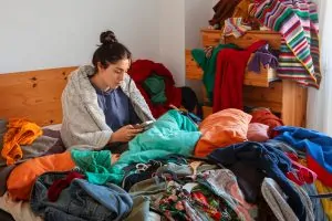 Sorting and organizing sentimental items during decluttering before moving